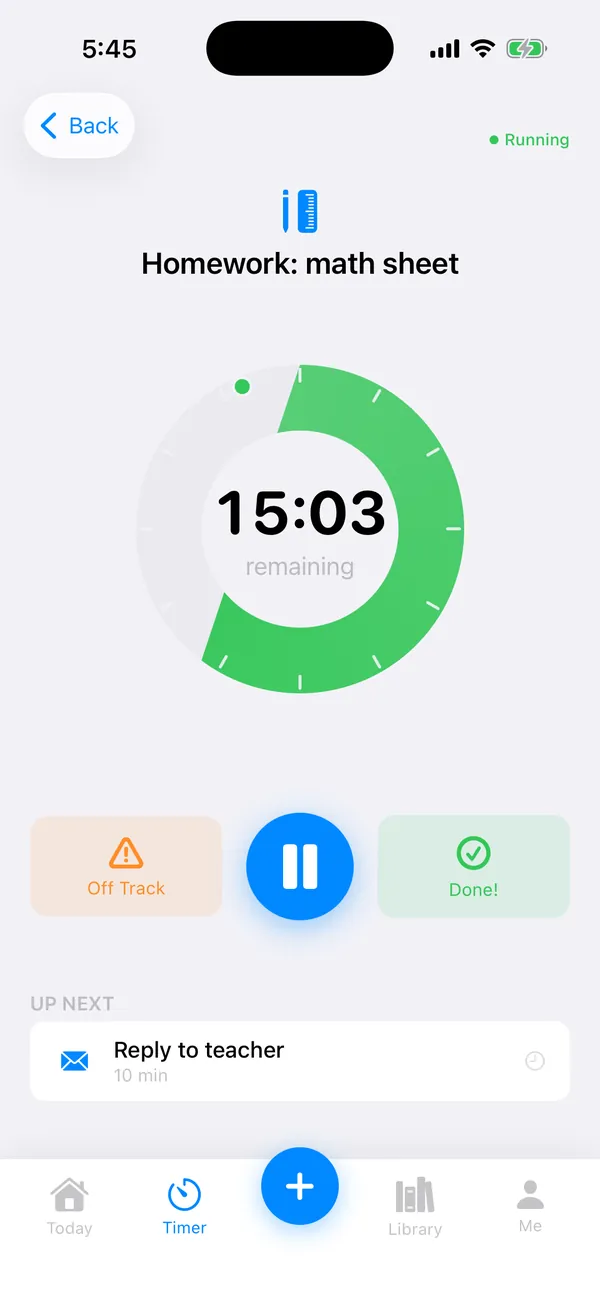 TimeNinja visual timer: a green ring with 15 minutes left on a math sheet